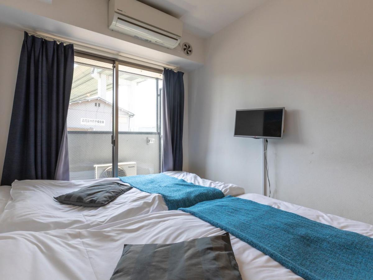 Tabist Gloire Osaka Apartment Exterior foto